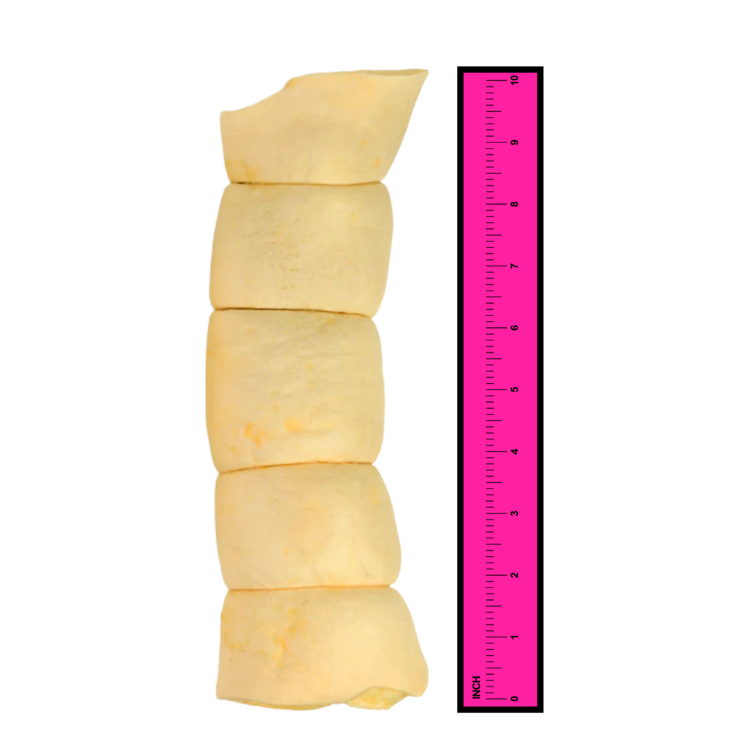 a pink 10-inch ruler next to a 10-inch beef cheek roll.