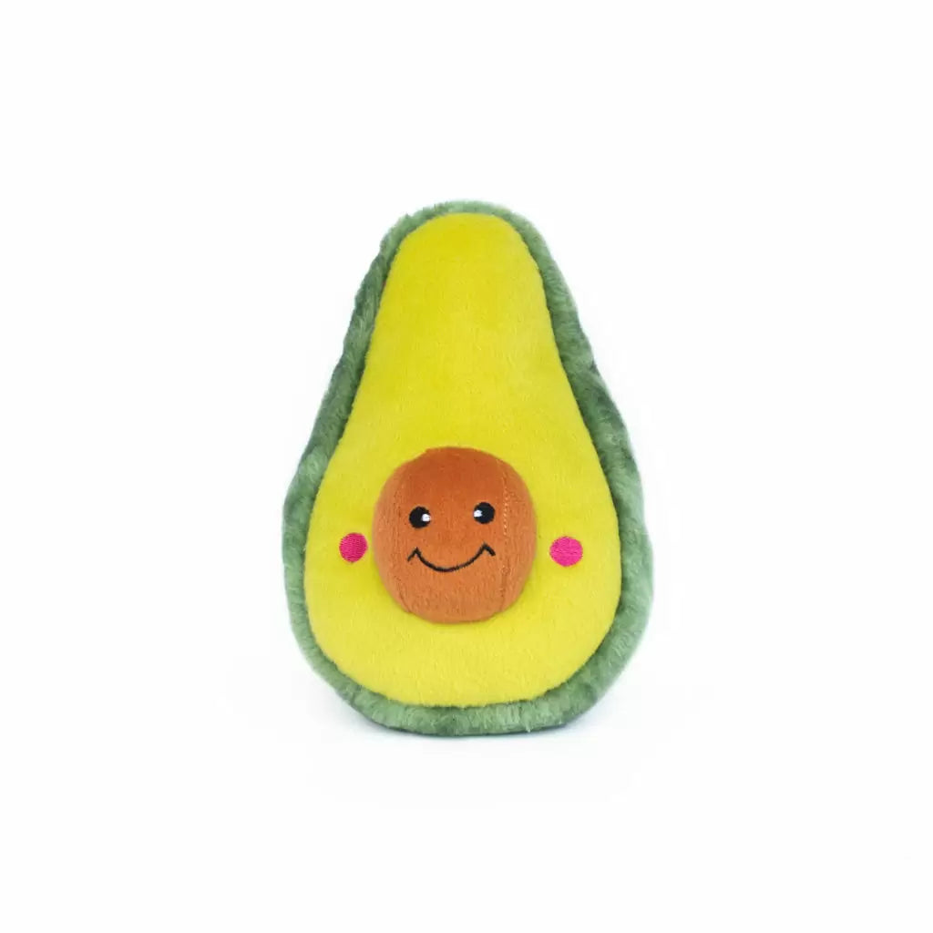 Avocado-shaped toy with a smiling face on a white background