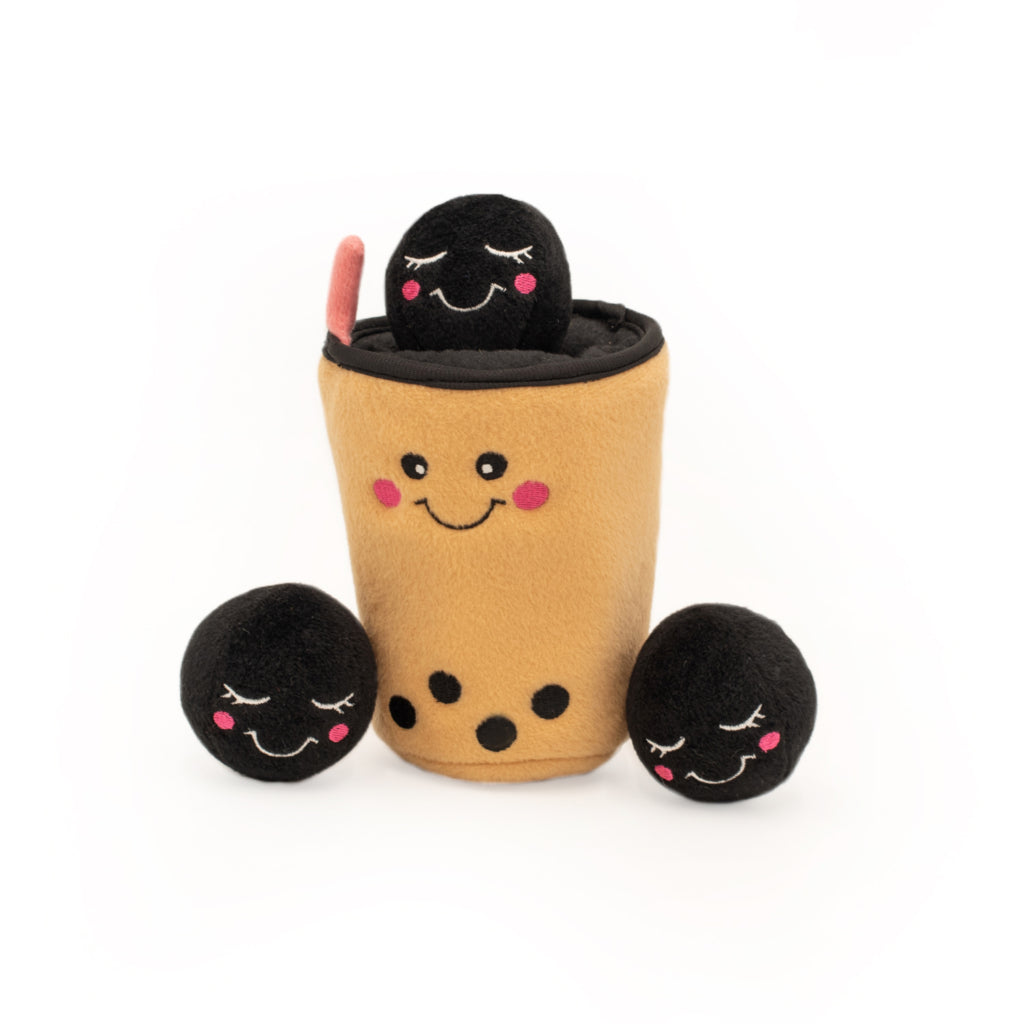 Plush toy resembling a bubble tea cup with three black boba balls on a white background