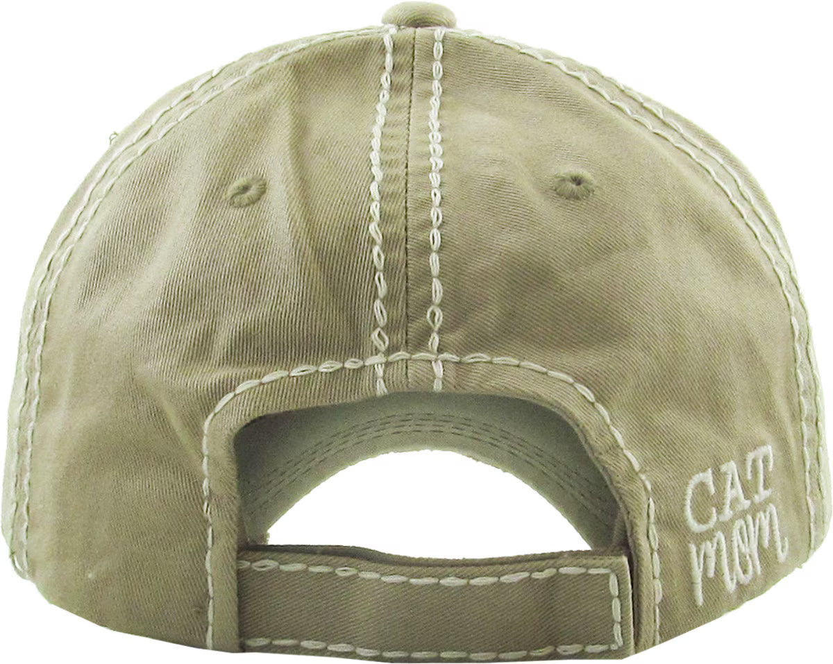 Beige cap with 'Cat Mom' text on it
