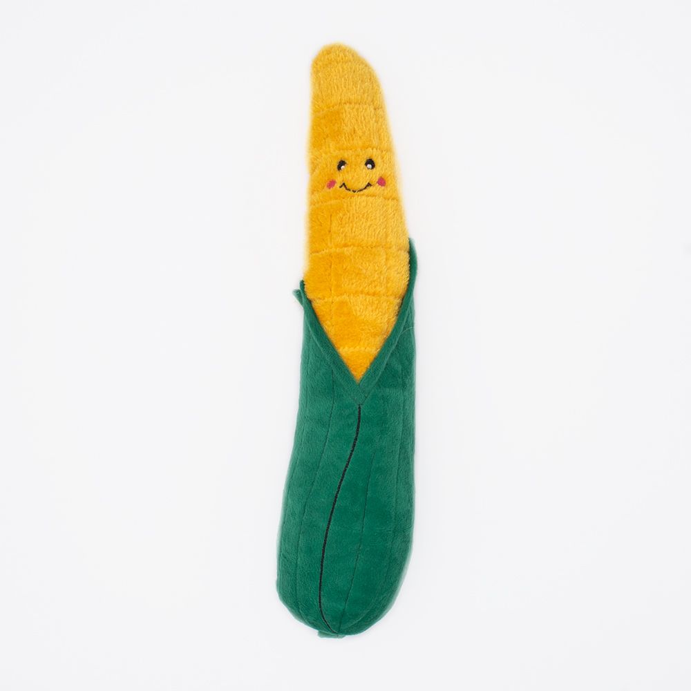 Plush dog toy shaped like a corn on the cob with a smiling face on a white background