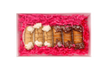 A boxed assortment of assorted vanilla and carob Grr-nolis 