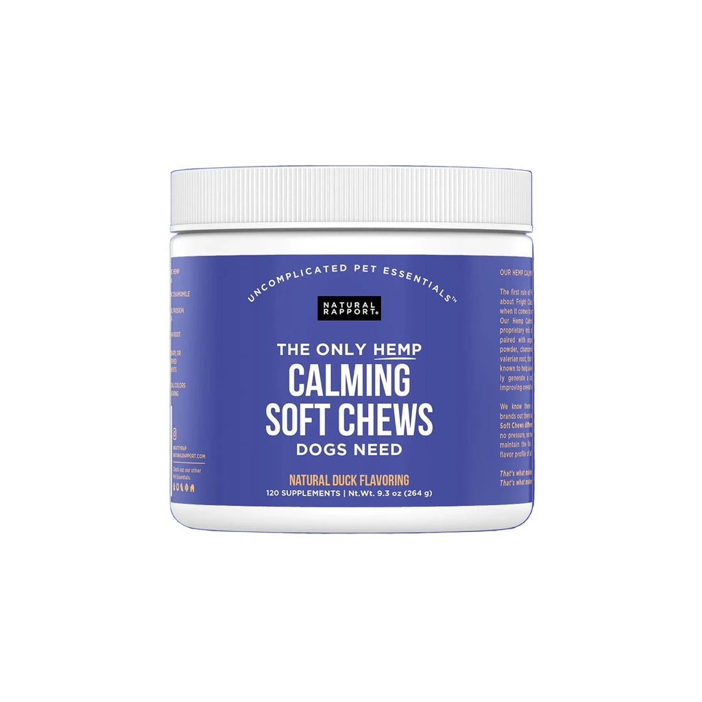 A white plastic jar of Natural Rapport Calming Soft Chews for dogs, featuring a blue label with white text, centered on a solid blue background.