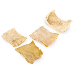 Five pieces of beef rawhide chips on a white background