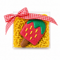 a gift box with one strawberry pupsicle and red gingham bow