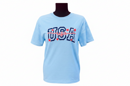 A light blue short-sleeve t-shirt that says "USA"